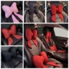 my-11134207-7rasc-mcfsunhkj5qi50.webp Random MOTUS Bow Car Neck Pillow